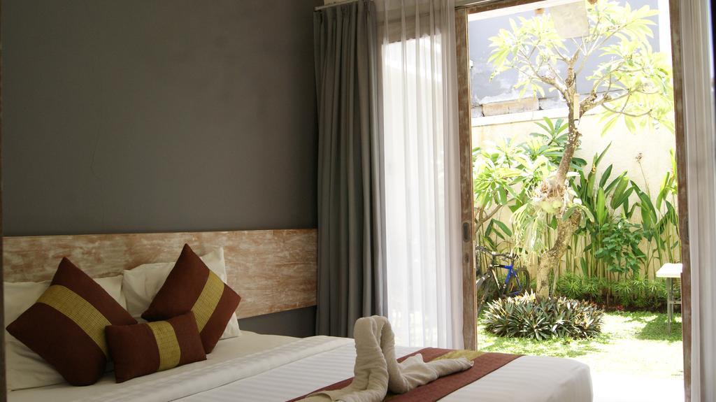 Hotel Sugiras Living à Denpasar Extérieur photo