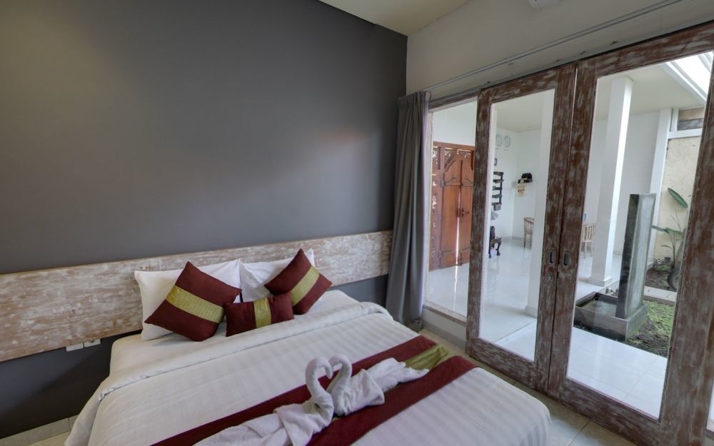 Hotel Sugiras Living à Denpasar Extérieur photo